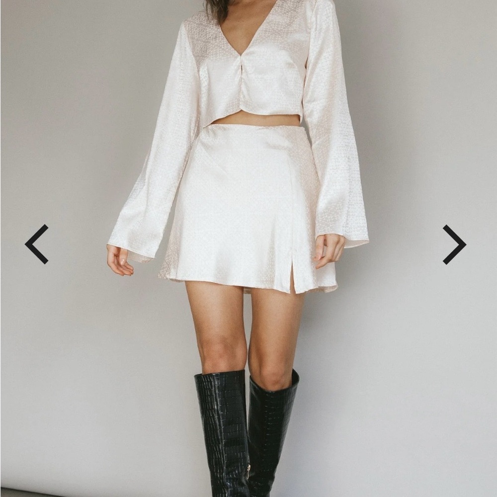 Selfie Leslie cream crop top and mini skirt